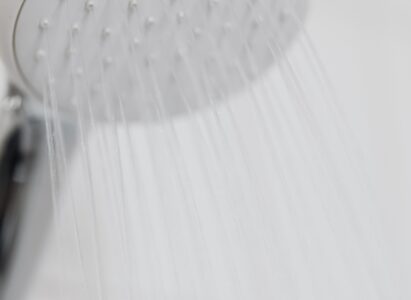 Why Does My Shower Head Leak When the Bath Faucet is Running?